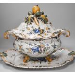 A 19th century French faience large tureen, cover and stand, 49cm wide