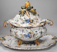 A 19th century French faience large tureen, cover and stand, 49cm wide