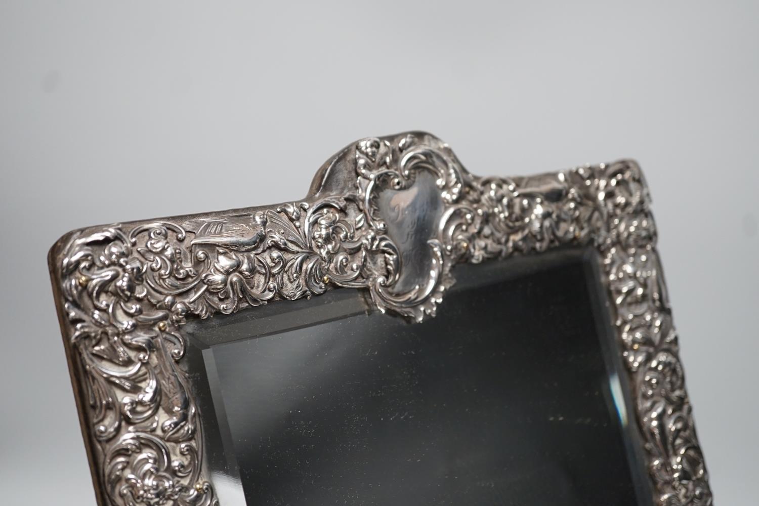 A late Victorian repousse silver mounted rectangular easel mirror, William Comyns, London, 1900, - Image 3 of 4