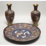 A Japanese cloisonné enamel dish, 30.5cm diameter and a pair of Japanese cloisonné enamel vases. (
