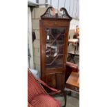 An Edwardian inlaid mahogany standing corner cabinet, width 60cm, height 202cm