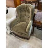 A Victorian style buttoned cord fabric spoonback rocking armchair, width 78cm, depth 70cm, height
