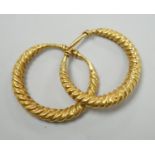 A pair of possibly Roman? yellow metal spiral twist loop earrings, 30mm, 8 grams.