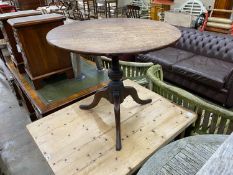 A George III style circular oak tripod tea table, diameter 76cm, height reduced 67cm