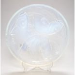 Pierre D'Avesn - a Lalique style opalescent glass dish, moulded in relief with three carp among