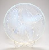 Pierre D'Avesn - a Lalique style opalescent glass dish, moulded in relief with three carp among