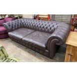 A Heals buttoned brown leather Chesterfield settee, length 234cm, depth 100cm, height 76cm