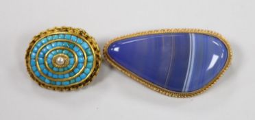 A modern 9ct gold mounted blue banded agate brooch, 47mm and an earlier yellow metal and turquoise