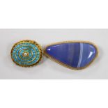 A modern 9ct gold mounted blue banded agate brooch, 47mm and an earlier yellow metal and turquoise