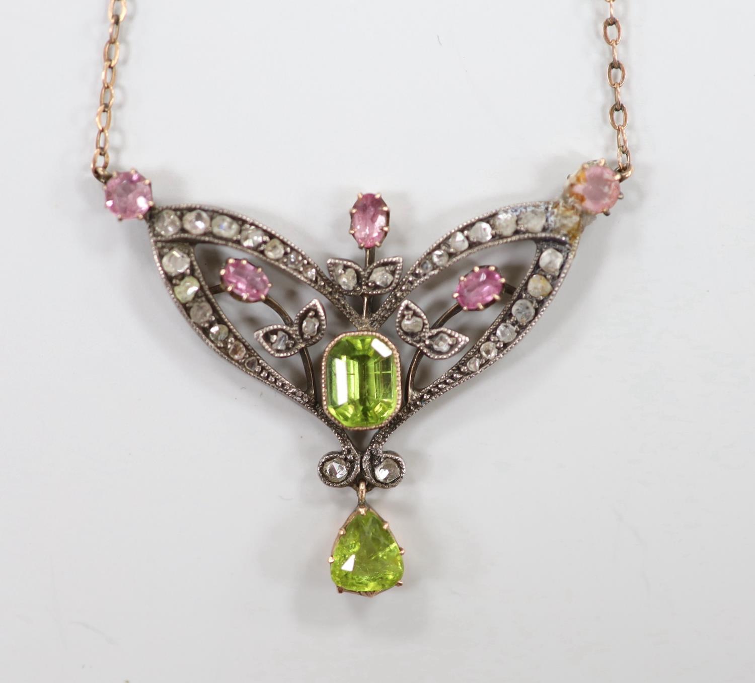 A late Victorian 9ct and white metal. peridot, pink topaz? and rose cut diamond set pendant necklace