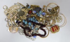 A quantity of assorted costume jewellery and other items including silver and enamel plaque and a