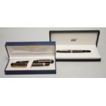 A Watermans marbled fountain pen and ballpoint pen ensuite, cased and a Montblanc ballpoint pen,