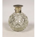 A George V silver and tortoiseshell pique mounted heavy cut glass scent bottle, London, 1921, height