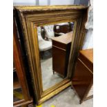A Victorian rectangular giltwood and composition wall mirror (converted picture frame), 134cm x