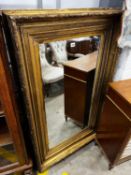 A Victorian rectangular giltwood and composition wall mirror (converted picture frame), 134cm x