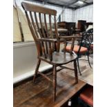 A Victorian elm and beech lathe back armchair, width 55cm, depth 47cm, height 113cm