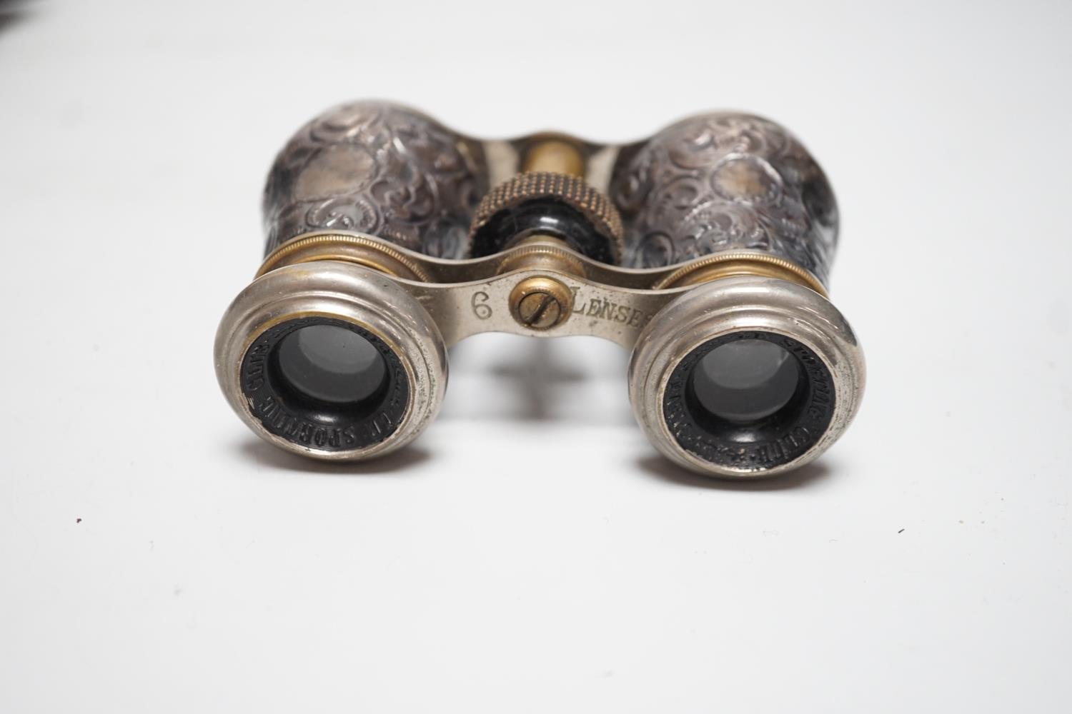 A pair of late Victorian repousse silver mounted brass opera glasses, Birmingham, 1900, (cased) - Image 4 of 4