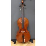 An early 20th century French half size cello, with soft case and bow. Ivory submission ref: FNBELLTV