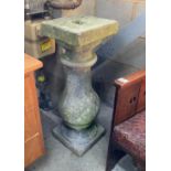 A carved stone baluster sun dial base, height 86cm