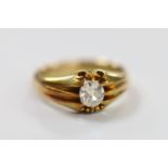 An early 20th century 18ct and claw set solitaire diamond ring, size P, gross weight 7.2 grams,