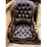 A Victorian mahogany armchair upholstered in deep buttoned brown leather, width 68cm, depth 80cm,