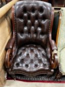 A Victorian mahogany armchair upholstered in deep buttoned brown leather, width 68cm, depth 80cm,