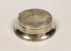 A 1950's part engine turned silver mounted circular jewellery casket, base diameter 12.8cm.