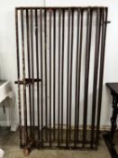 A pair of wrought iron garden gates, each gate width 93cm, height 160cm