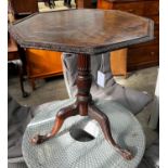 A George III and later octagonal mahogany tilt top tripod tea table, width 68cm, height 74cm