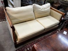 A reproduction walnut and beech two seater settee, length 174cm, depth 86cm, height 74cm