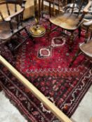 A Hamadan red ground carpet, 240 x 180cm
