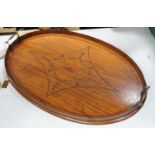 A large oval marquetry satinwood tray. 66cm wide