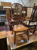 Five reproduction Windsor elm and beech dining chairs, one with arms