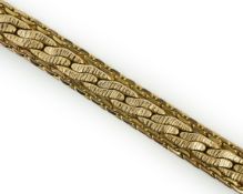 A modern Italian Uno-A-Erre 9ct gold bracelet, 19cm, (repair), 22.2 grams.