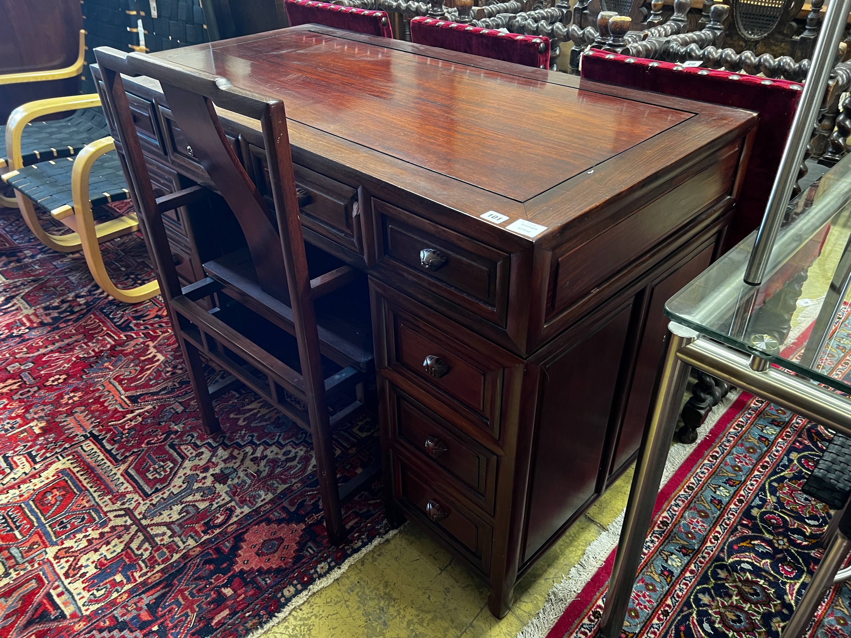 A Chinese hardwood kneehole desk, length 131cm, depth 65cm, height 83cm and elbow chair - Image 4 of 7