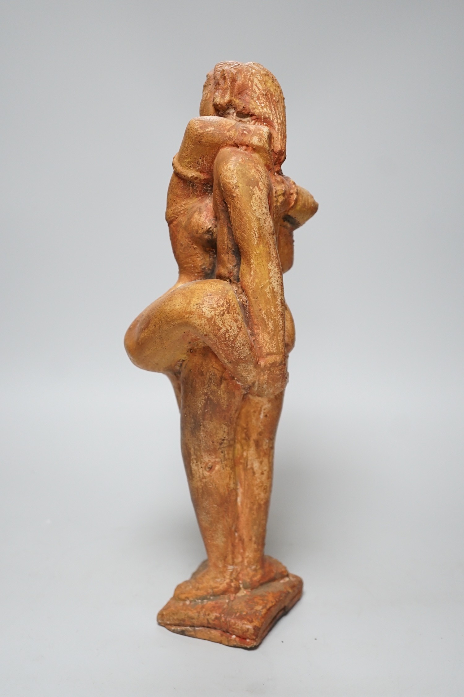 A painted plaster figure of an embracing Indian couple, 37cm tall - Image 2 of 4