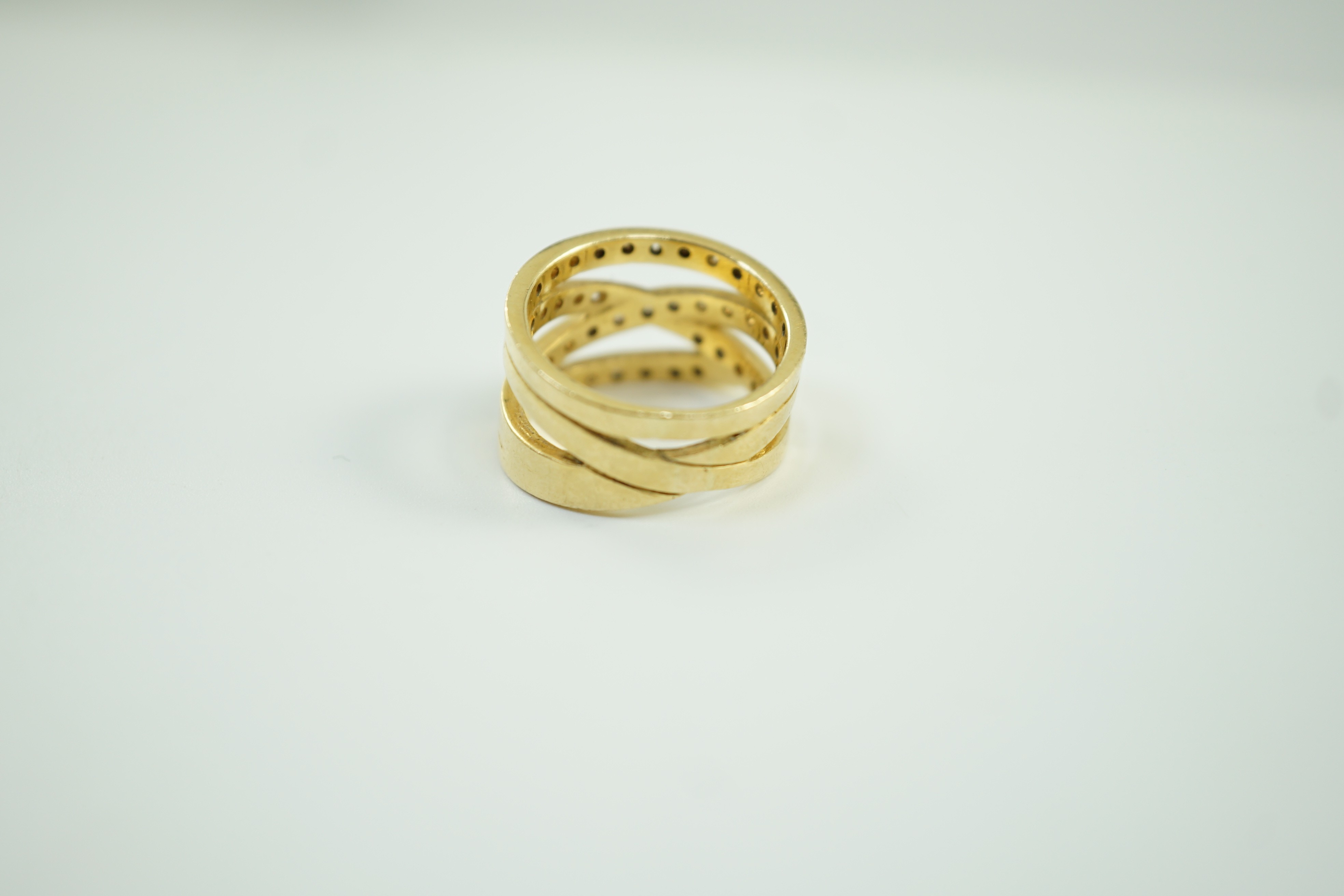 A modern 750 and diamond chip cluster set multi shank dress ring, size P, gross 10.1 grams. - Image 4 of 6