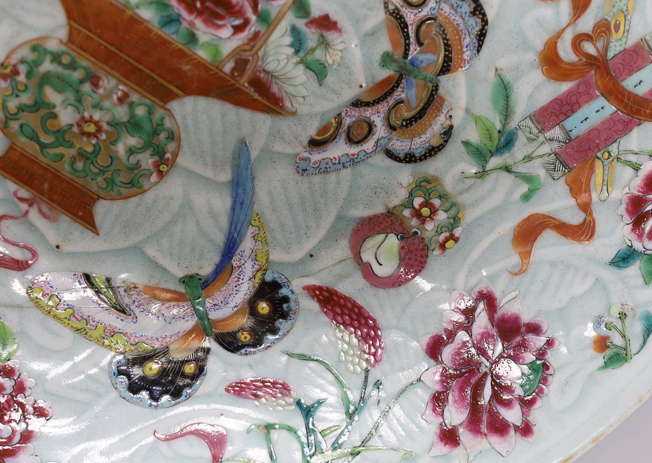 A 19th century Chinese famille rose enamelled carved celadon glazed dish, 34cm - Image 3 of 3