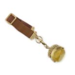 A late Victorian yellow metal and citrine set spinning fob, width 37mm, on a yellow metal mounted