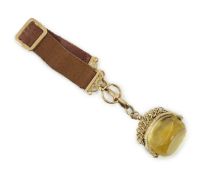 A late Victorian yellow metal and citrine set spinning fob, width 37mm, on a yellow metal mounted