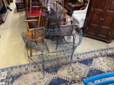 A Victorian style painted wirework bowfront pot stand, width 120cm, depth 62cm, height 122cm