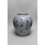 A Chinese blue and white 'lotus' jar, 17th century, 38cms high, restored