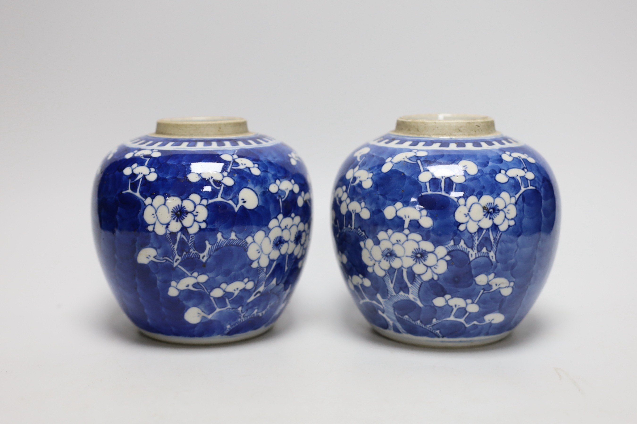 A pair of 19th centiury Chinese blue and white prunus jars, 13.5cms high - Image 2 of 4