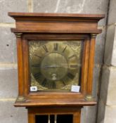 An 18th century walnut thirty hour longcase clock, the 10 inch square brass dial marked Sam Hammond,