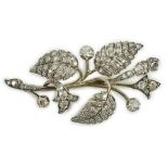 A mid 20th century yellow and white metal, diamond cluster set floral spray brooch, 61mm, gross
