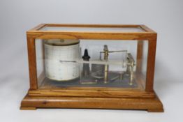 A Negretti & Zambra oak cased barograph, 34cm wide