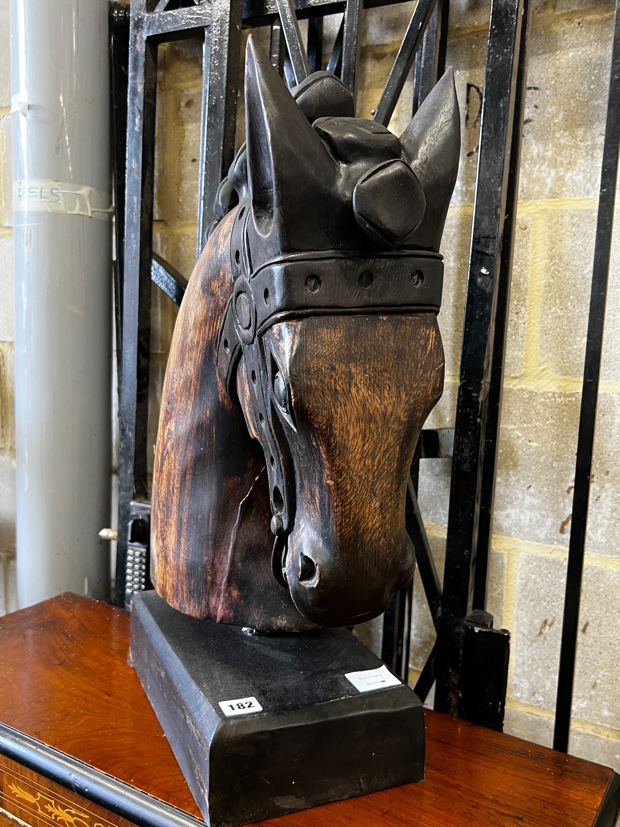 A stylised carved wood model of a horse's head on rectangular plinth, height 59cm - Image 2 of 2