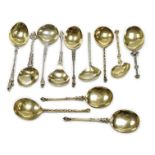 Twelve assorted 19th century and later Scandinavian or Dutch? gilt or parcel gilt white metal