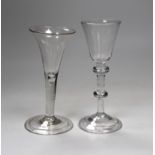 A George II double knopped stem wine glass and a similar ale flute, 16cm