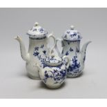 Two 18th century Worcester Mansfield pattern coffee pots and a similar teapot, (all with covers)